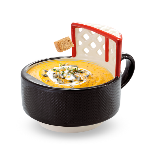 The Hockey Mug with a Net! START YOUR MORNINGS WITH FUN! Play with your food with this original hockey mug with an attached net. Perfect for scoring mini marshmallows into cocoa, cereal into milk, crackers into soup, or toppings onto ice cream! Something to root for in your morning routine!